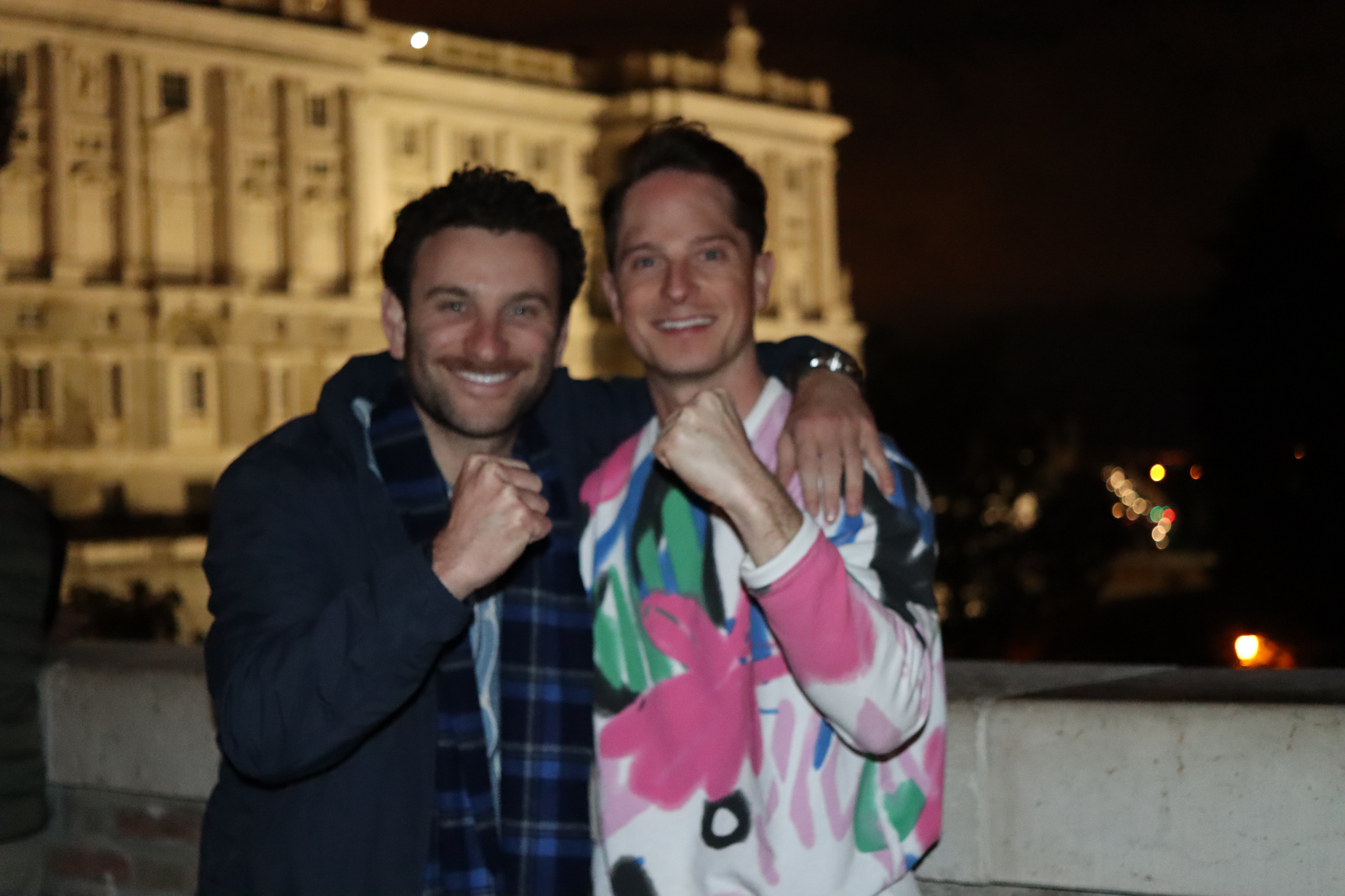 Casa founders Alex Rios and Jake Levinson in front of the Royal Palace in Madrid